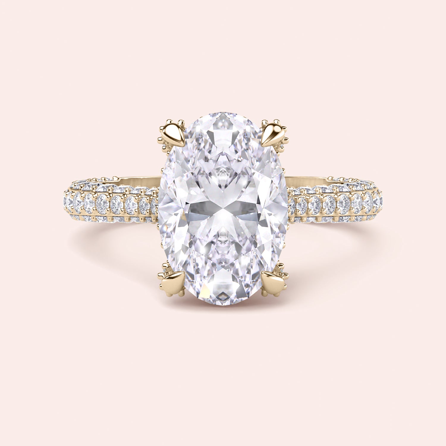 Yellow gold oval diamond engagement ring, straight-on front view with pavé shank and claw prongs | #14KRecycledYellowGold #18KRecycledYellowGold