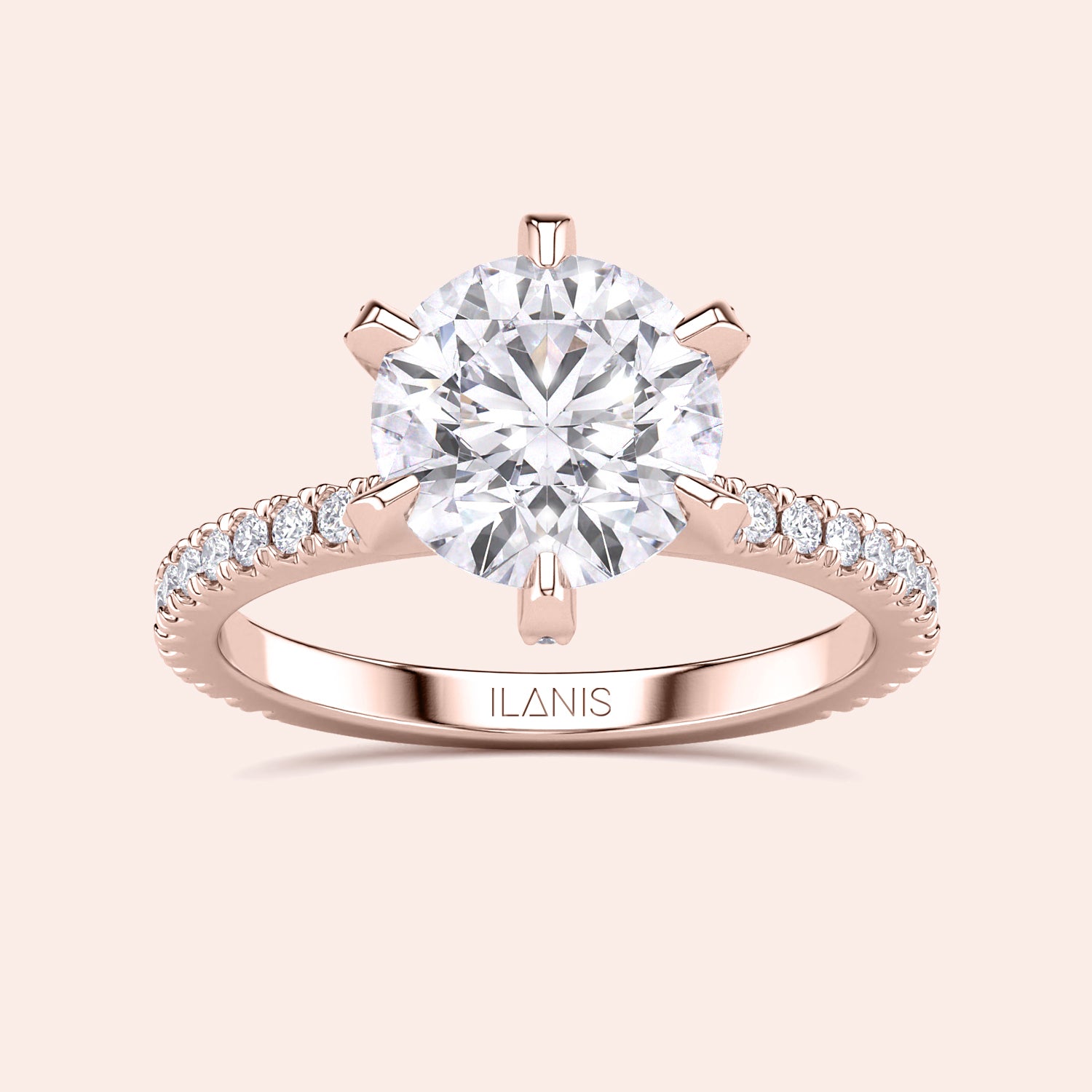 Front view of round brilliant diamond engagement ring in rose gold with pavé band, showcasing center stone fire and symmetry | #14KRecycledRoseGold #18KRecycledRoseGold