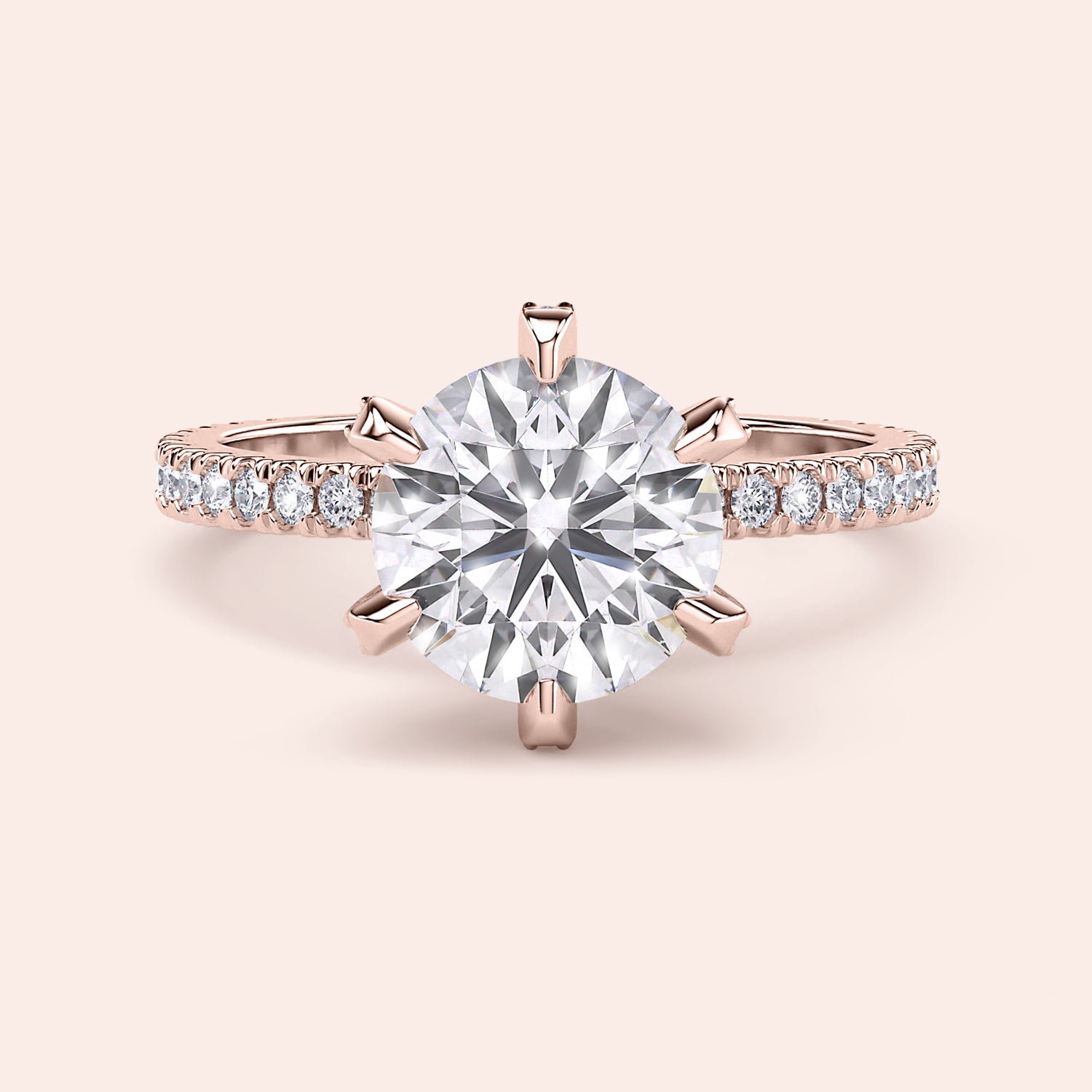Top view close-up of rose gold round diamond engagement ring with pavé band, emphasizing diamond cut, sparkle and prong alignment | #14KRecycledRoseGold #18KRecycledRoseGold