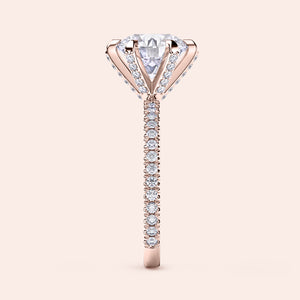 Vertical side view of rose gold diamond engagement ring with pavé band, highlighting band detailing and setting precision 