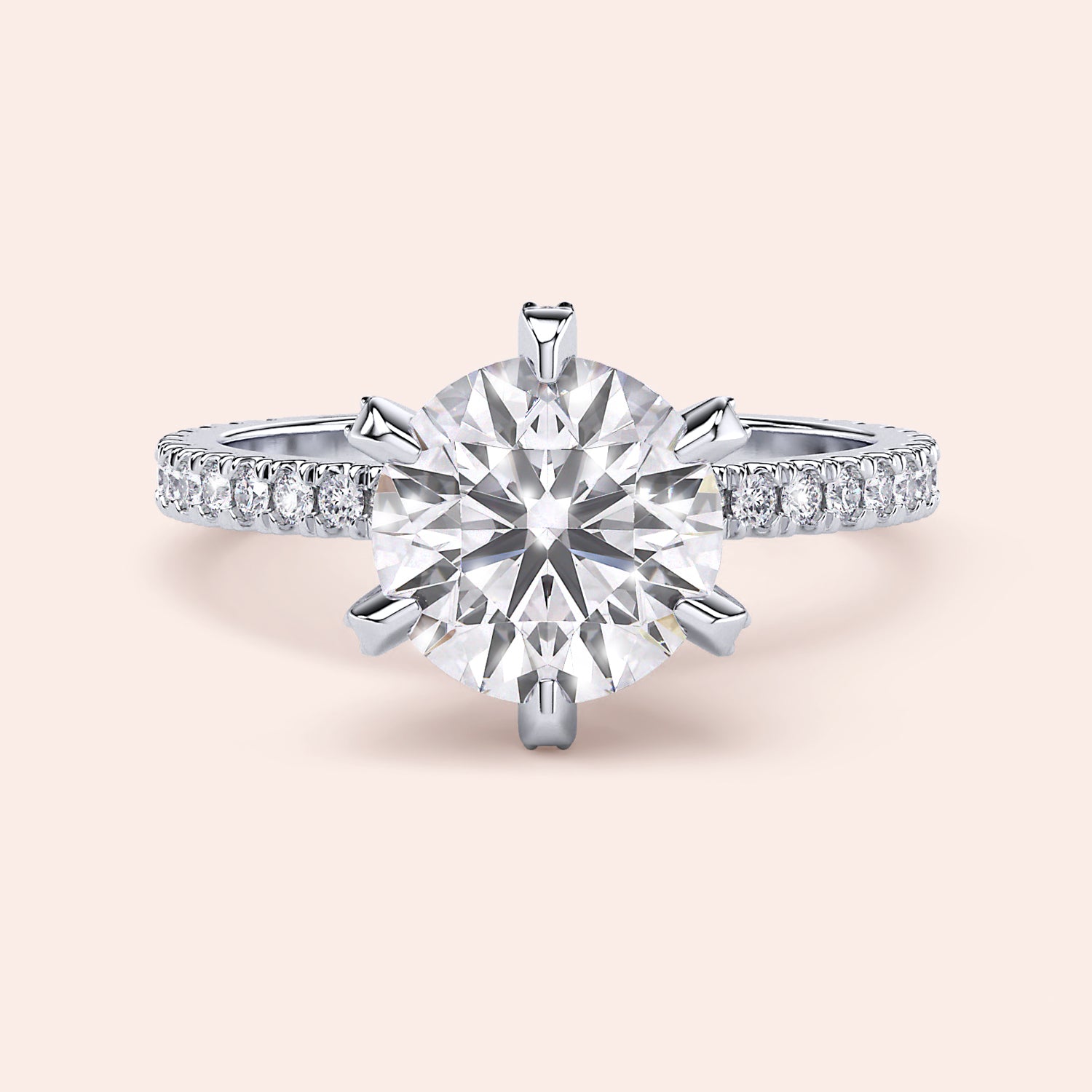 Front view of round brilliant diamond engagement ring in white gold or platinum with pavé band, showcasing maximum brilliance and symmetry | #14KRecycledWhiteGold #18KRecycledWhiteGold #Platinum