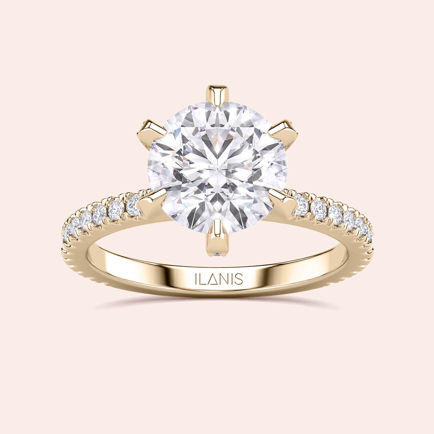 Top view close-up of yellow gold round diamond engagement ring with pavé band, emphasizing cut precision, sparkle and prong accents | #14KRecycledYellowGold #18KRecycledYellowGold