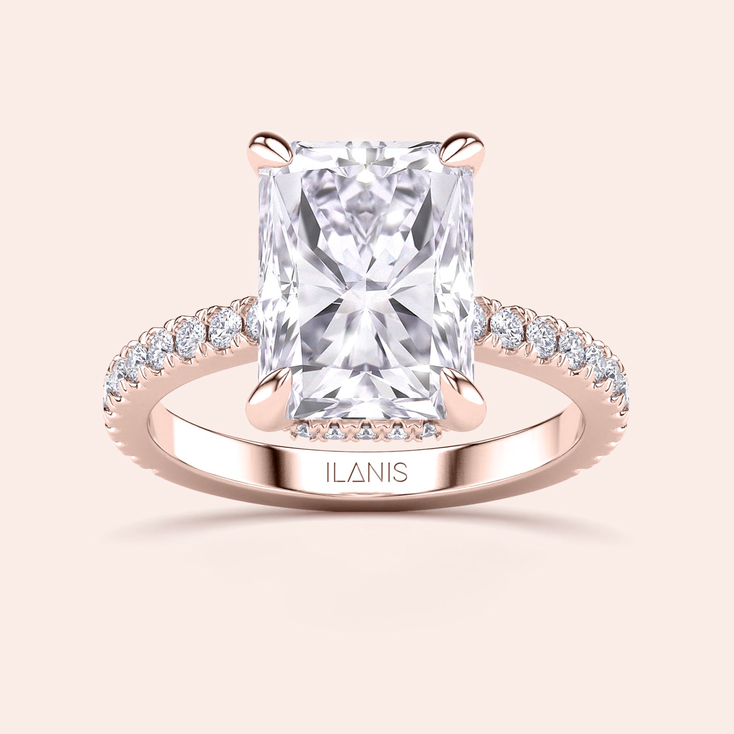 Side profile of rose gold radiant cut diamond engagement ring with pavé band and accent diamonds on prongs, showcasing elevated gallery and craftsmanship | #14KRecycledRoseGold #18KRecycledRoseGold