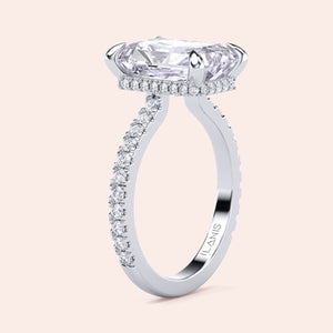 Vertical side view of white gold radiant cut diamond engagement ring with pavé band, highlighting structure, craftsmanship and fine diamond setting 