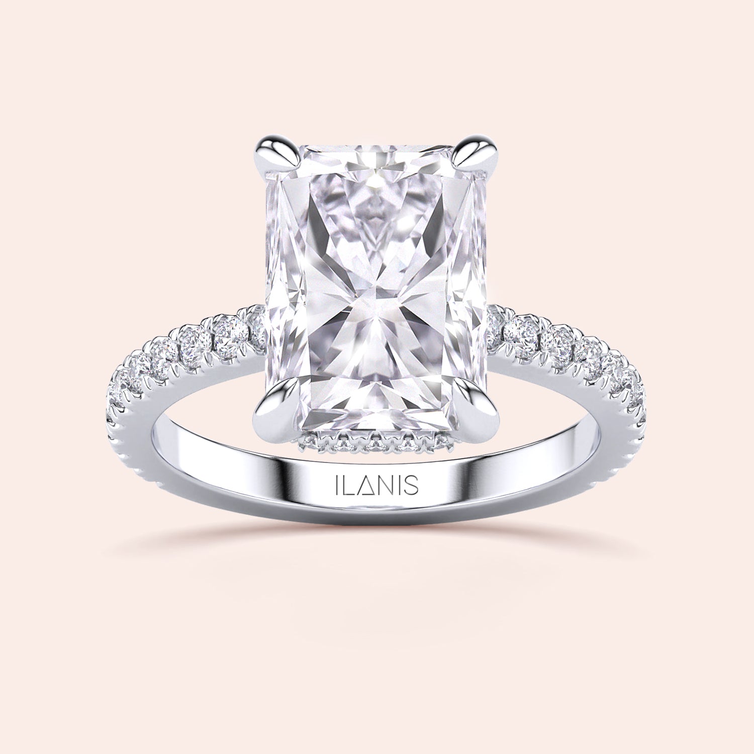 Top view close-up of radiant cut diamond engagement ring in white gold with pavé band, showcasing cut precision, sparkle and refined prongs | #14KRecycledWhiteGold #18KRecycledWhiteGold #Platinum