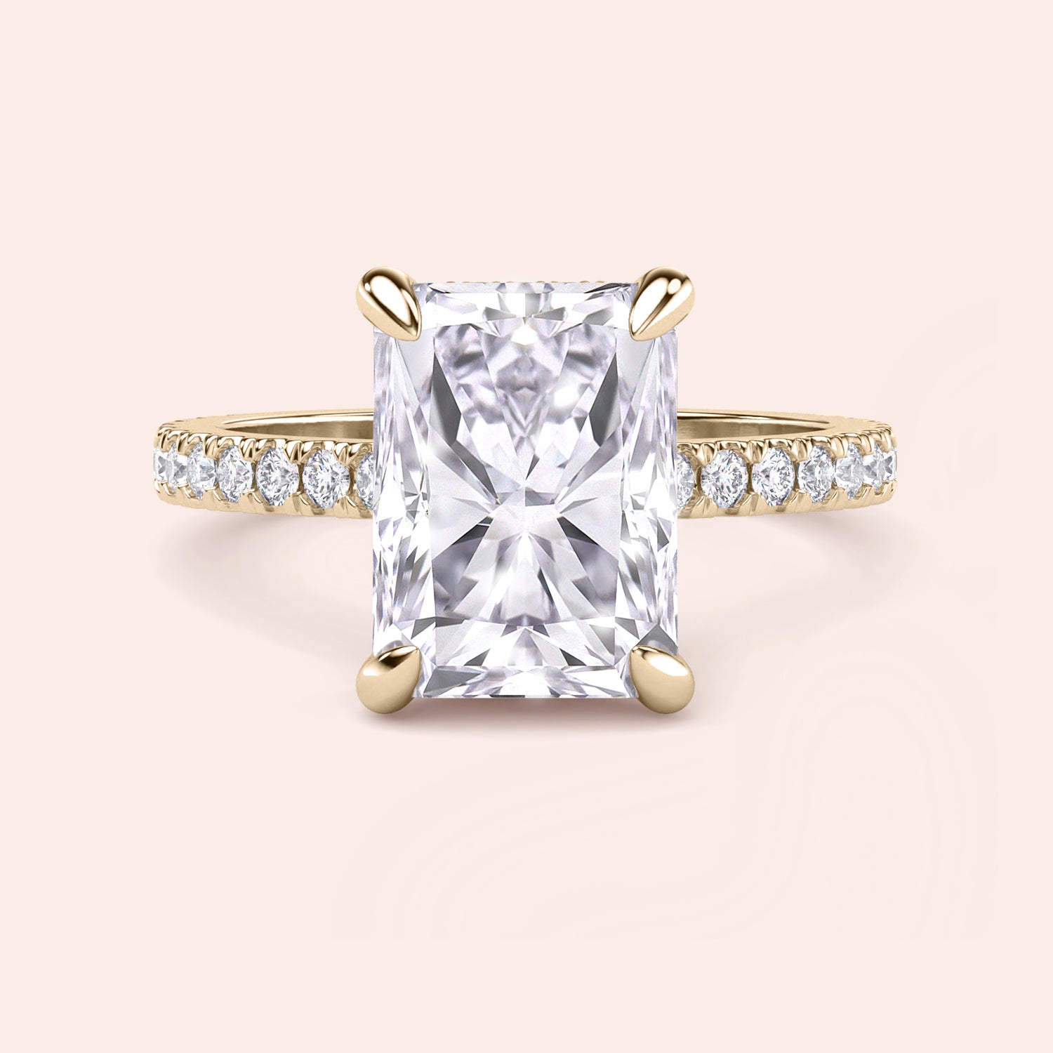 Front view of radiant cut diamond engagement ring in yellow gold with pavé band, highlighting symmetry, brilliance and center stone presence | #14KRecycledYellowGold #18KRecycledYellowGold