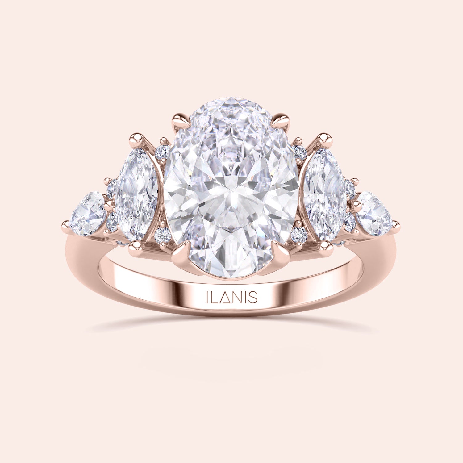 Oval cut three stone diamond engagement ring yellow gold with pear side stones front view, classic oval center diamond ring, luxury bridal jewelry design | #14KRecycledRoseGold #18KRecycledRoseGold