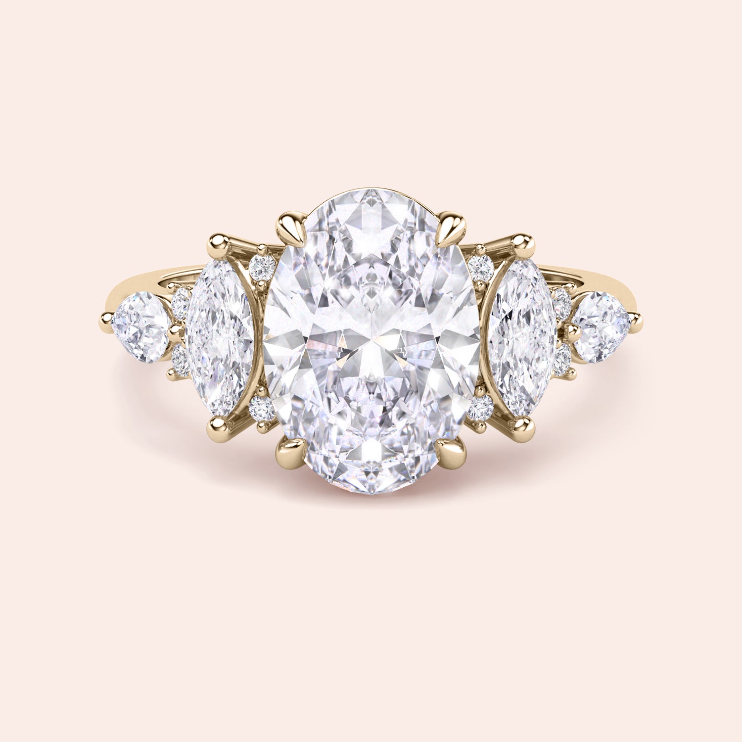Yellow gold oval diamond three stone engagement ring side profile with pear side stones, elevated setting and handcrafted fine jewelry detail | #14KRecycledYellowGold #18KRecycledYellowGold