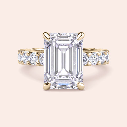 Emerald cut diamond engagement ring in yellow gold with eternity band, bold center stone ring, elegant step cut diamond bridal design 