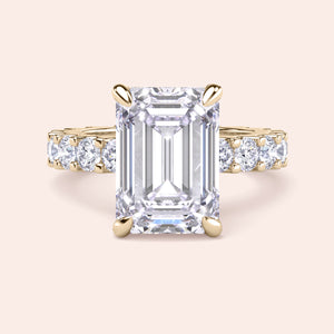 Emerald cut diamond engagement ring in yellow gold with eternity band, bold center stone ring, elegant step cut diamond bridal design 