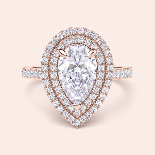 Pear diamond halo engagement ring in rose gold, double halo setting with brilliant pavé diamonds, romantic bridal ring design 