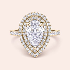 Yellow gold pear shaped diamond ring with double halo and pavé band, bold center stone with layered halo detail, fine jewelry engagement ring 