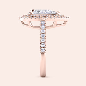 Pear shaped diamond engagement ring rose gold with double halo and pavé band, side profile view, elevated hidden setting, luxury bridal ring 