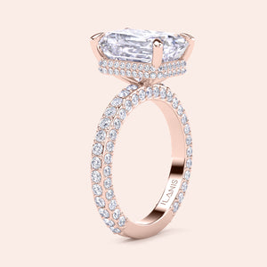 Radiant cut diamond ring rose gold with pavé band, elevated setting with hidden halo detail, elegant side profile view 