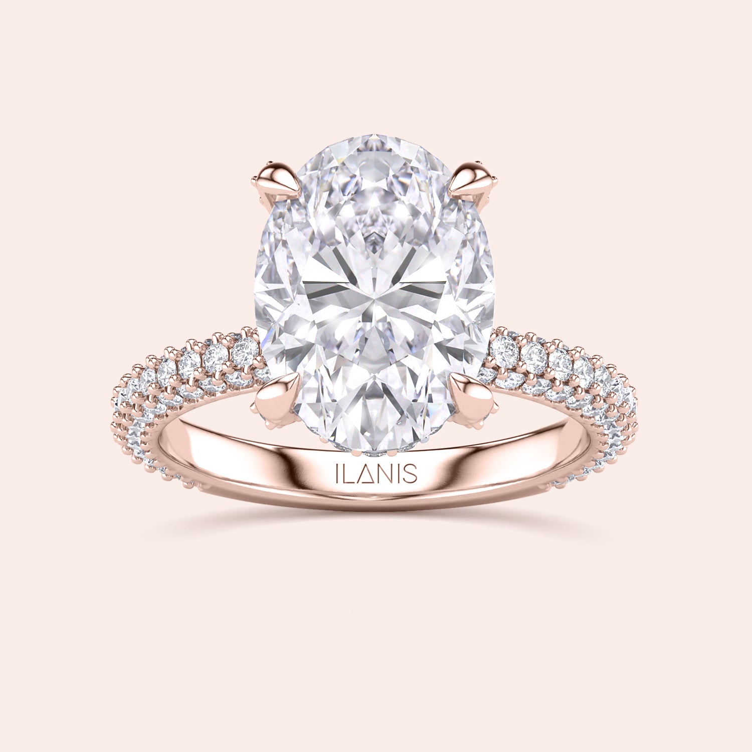Oval cut diamond engagement ring in rose gold with pavé band and hidden halo, classic solitaire design with sparkling diamond accents | #14KRecycledRoseGold #18KRecycledRoseGold