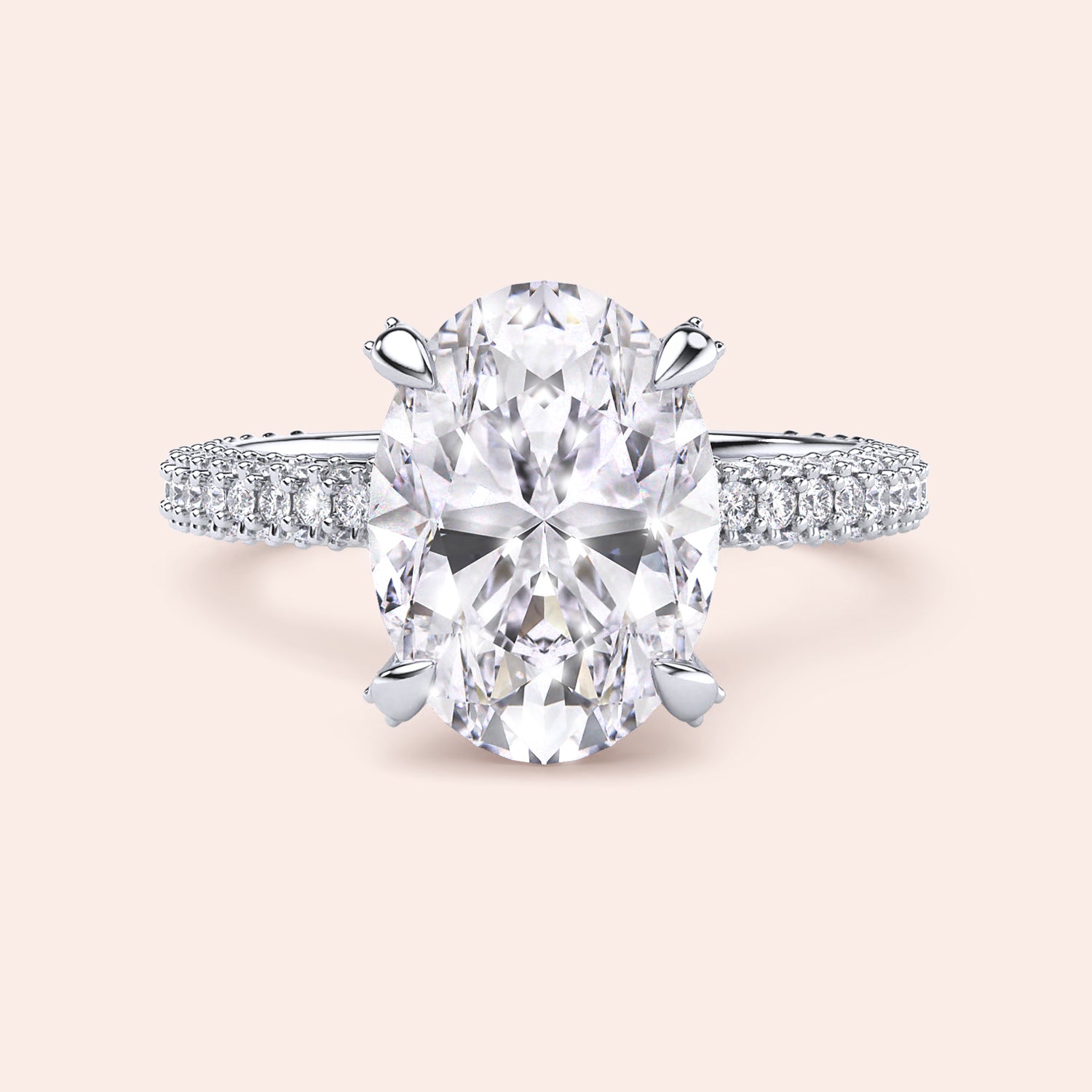Pear cut diamond engagement ring in white gold with tapered baguette side stones, classic three stone design with brilliant center diamond | #14KRecycledWhiteGold #18KRecycledWhiteGold #Platinum