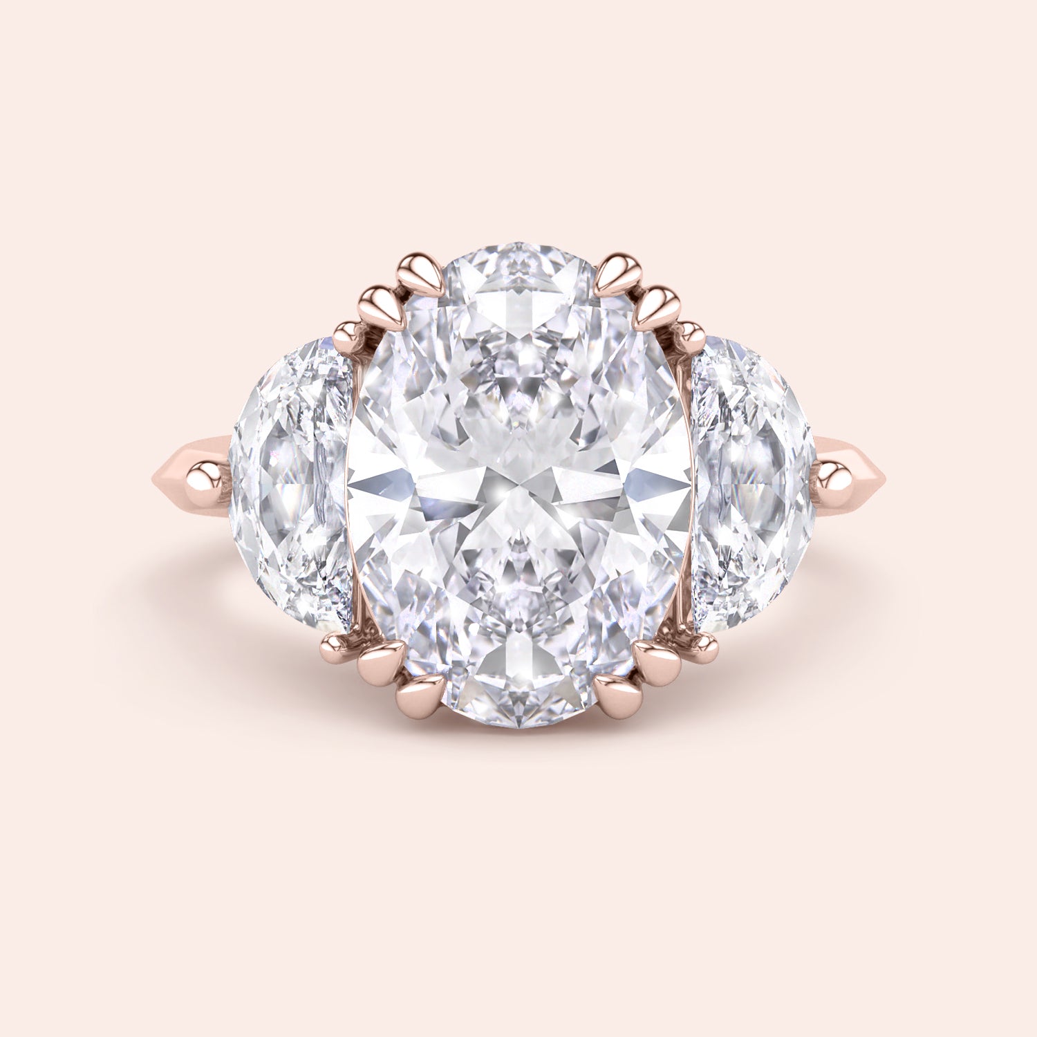 Oval cut diamond engagement ring in rose gold with pear side diamonds, classic three stone design with brilliant center stone |#14KRecycledRoseGold #18KRecycledRoseGold