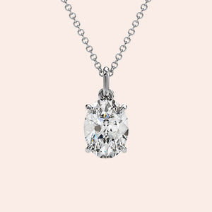 A stunning close-up of an oval-cut diamond pendant in a four-prong white gold setting. The timeless simplicity of this solitaire pendant makes it an ideal gift or personal keepsake.

