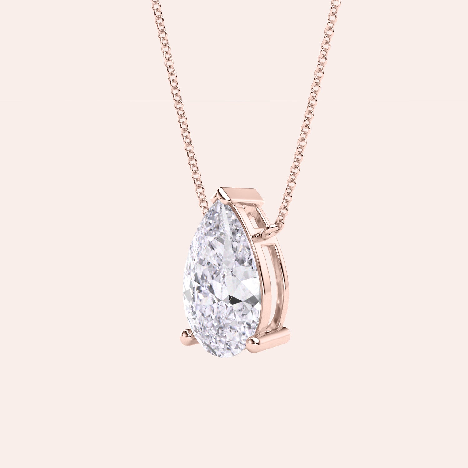 Pear shaped diamond pendant necklace in rose gold, side view of solitaire setting, minimal and refined fine jewelry | #14KRecycledRoseGold #18KRecycledRoseGold