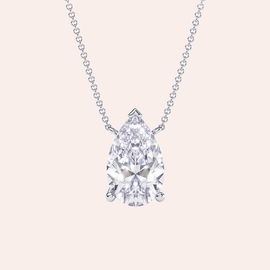 White gold pear diamond solitaire necklace, elegant teardrop pendant on delicate chain, timeless everyday luxury gift 