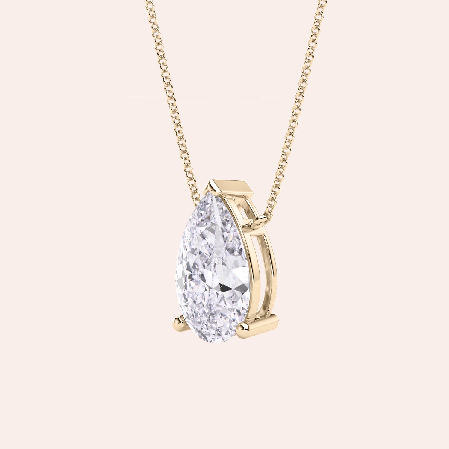 Pear shaped diamond pendant necklace in yellow gold, side view of solitaire setting, minimal and refined fine jewelry | #14KRecycledYellowGold #18KRecycledYellowGold