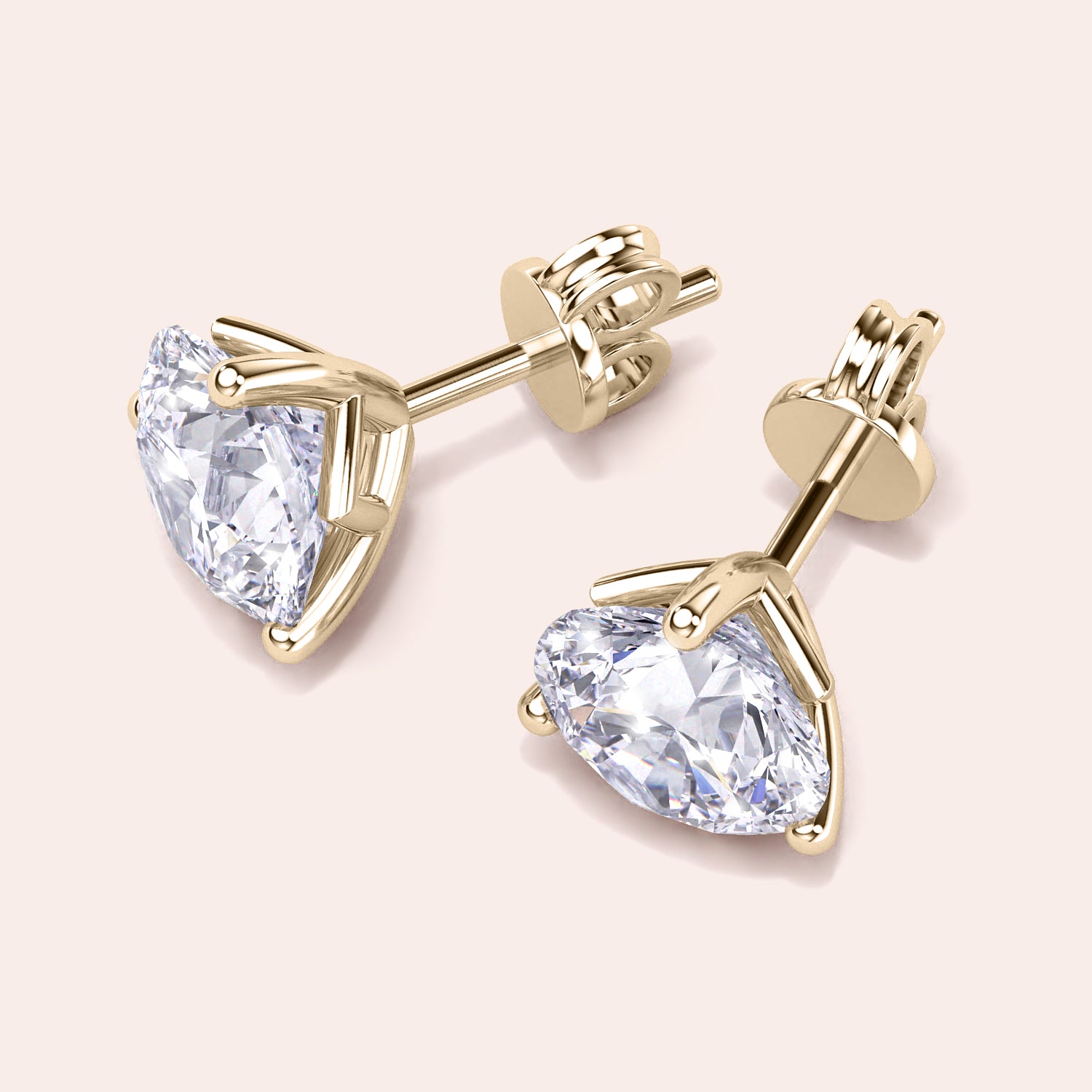 Luxurious 3-Prong Martini Diamond Earrings in yellow gold, isolated on beige background |

#14KRecycledYellowGold 
#18KRecycledYellowGold 
