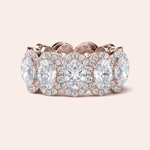 Elegant rose gold eternity band featuring marquise-cut diamonds, available in 14K and 18K gold or platinum.  Wedding band design. 
