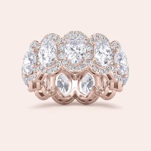 Elegant rose gold eternity band featuring marquise-cut diamonds, available in 14K and 18K gold or platinum.  Wedding band design. 