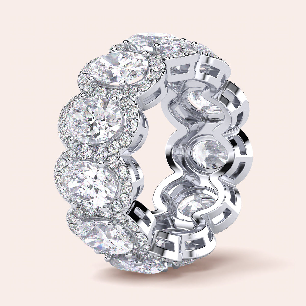 Elegant white gold wedding band featuring an oval eternity trellis design, available in 14K or 18K gold or platinum. 