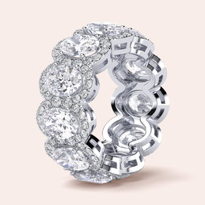 Elegant white gold wedding band featuring an oval eternity trellis design, available in 14K or 18K gold or platinum. 