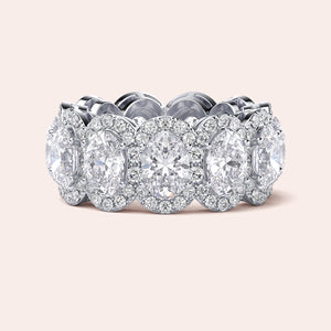 Elegant white gold wedding band featuring an oval eternity trellis design, available in 14K or 18K gold or platinum. 