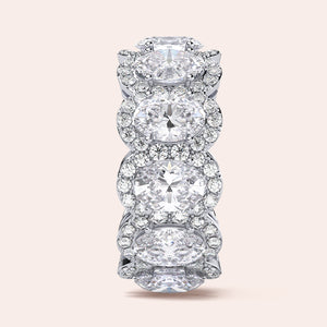 Elegant white gold wedding band featuring an oval eternity trellis design, available in 14K or 18K gold or platinum. 