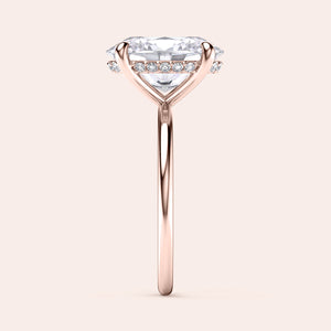 Elegant heart-shaped diamond engagement ring in 14K or 18K rose gold or platinum, showcasing a classic solitaire design.