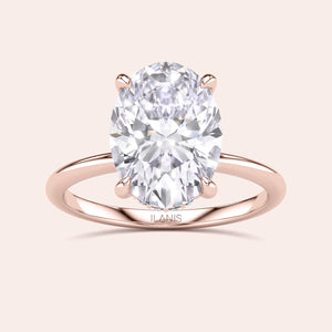 Rose gold diamond engagement ring with oval-cut diamond, available in 14K, 18K, or platinum for timeless elegance.