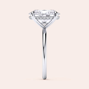 Stunning 14K or 18K gold solitaire ring with heart-shaped diamond and accent diamonds, perfect for engagements and special occasions.