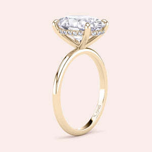Solitaire engagement ring with oval cut diamond in 14K or 18K gold or platinum band, perfect for a timeless romance.