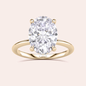 Elegant oval diamond ring in 14K or 18K gold or platinum, featuring exquisite craftsmanship and a stunning oval-shaped diamond.
