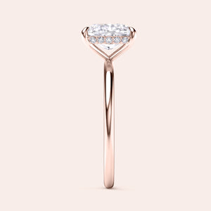 Elegant solitaire engagement ring with heart-shaped diamond in 14K or 18K gold or platinum, featuring brilliant side accents. 
