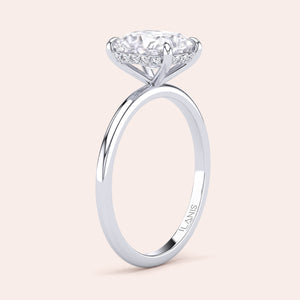 Elegant 14K gold engagement ring with a round diamond and dazzling halo, showcasing exquisite craftsmanship for special occasions. 