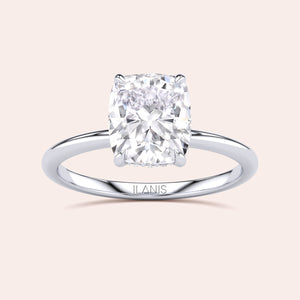 Elegant 14K engagement ring featuring a cushion-cut diamond in a sleek gold band for a timeless, sophisticated look. 