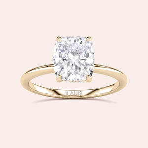 Stunning cushion-cut diamond engagement ring, available in 14K, 18K gold, or platinum, featured on a sleek band. 