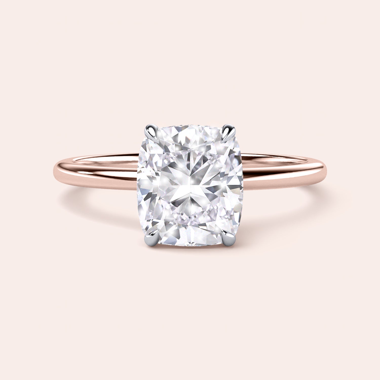 Two-tone 14K rose and white gold cushion-cut diamond engagement ring with secret halo design, perfect for timeless elegance. |
#14KRecycledRose/WhiteGold
#18KRecycledRose/WhiteGold