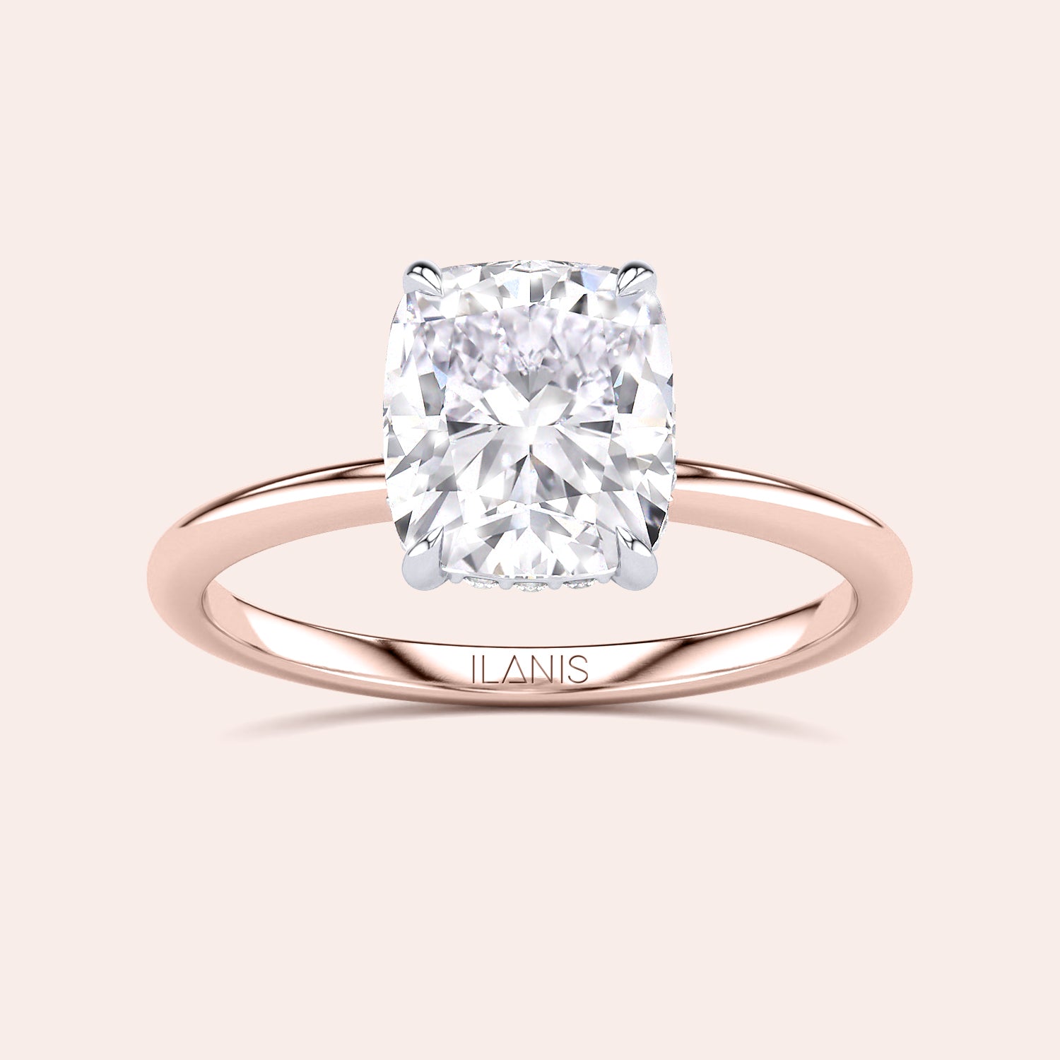 Two-tone 14K/18K rose and white gold engagement ring featuring a cushion-cut diamond in a secret halo setting. |
#14KRecycledRose/WhiteGold
#18KRecycledRose/WhiteGold