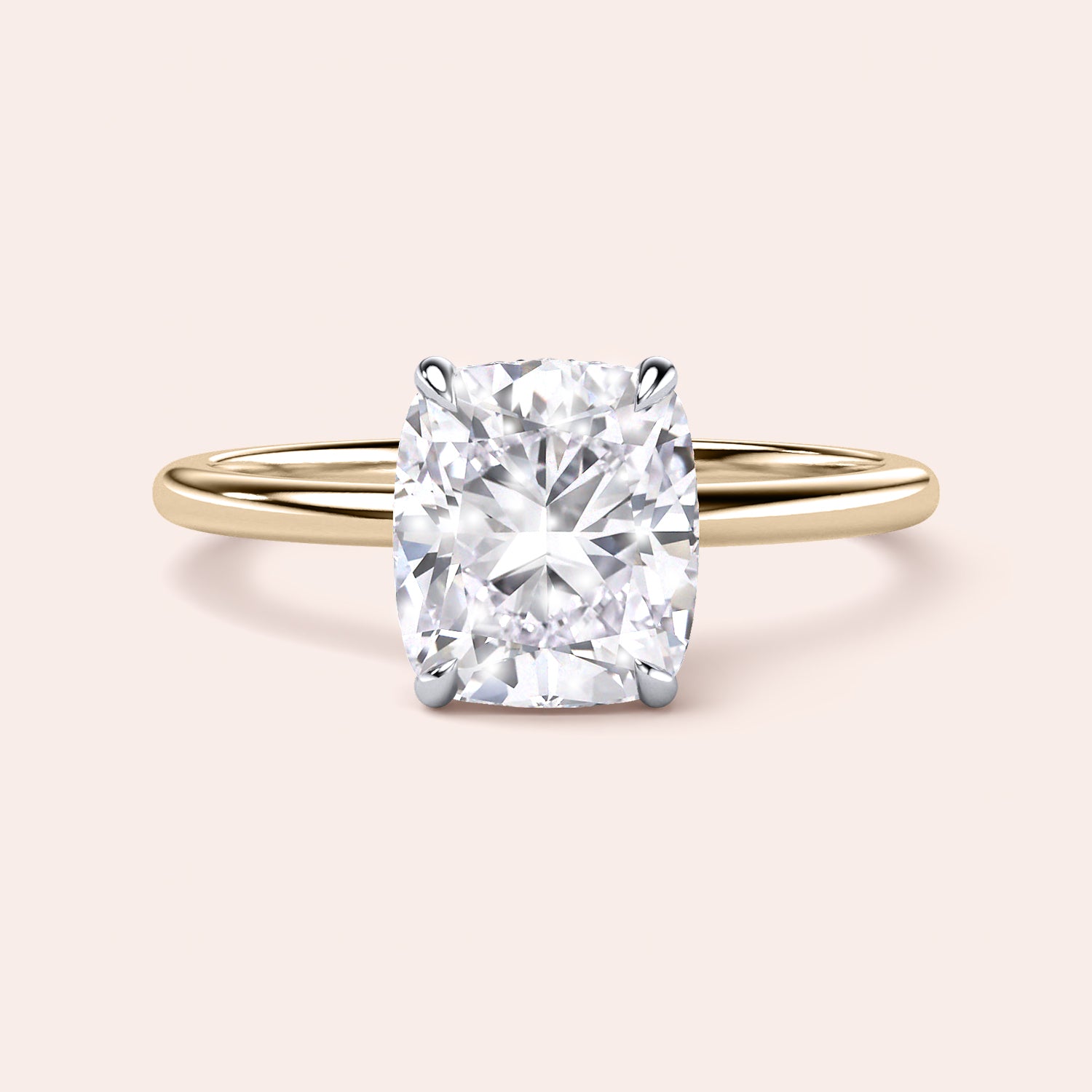 Two-tone 14K/18K gold engagement ring featuring a cushion-cut diamond in white and yellow gold. |
#14KRecycledYellow/WhiteGold
#18KRecycledYellow/WhiteGold 