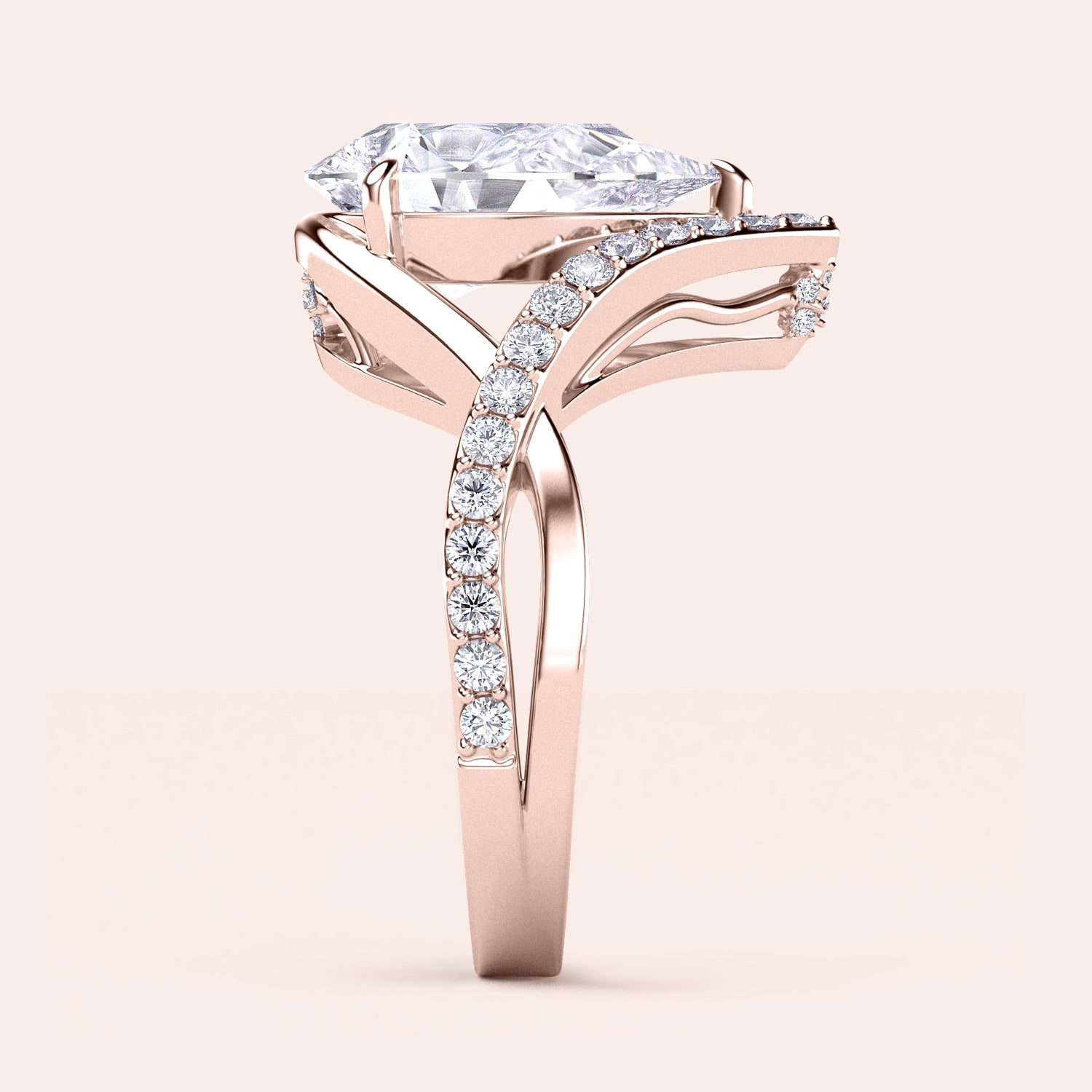 Elegant 14K rose gold engagement ring with a marquise-cut diamond and smaller round diamonds, showcasing stunning sparkle and sophistication.|

#14KRecycledRoseGold
#18KRecycledRoseGold

