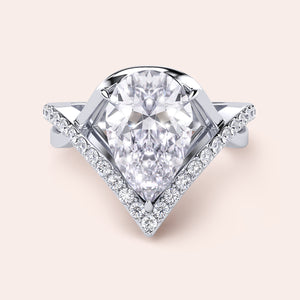 Elegant pear-shaped diamond ring in 14K or 18K gold or platinum with a dazzling halo design, perfect for any occasion.