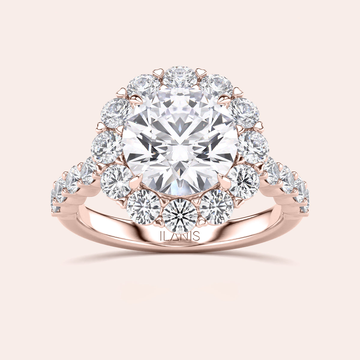 Rose gold diamond halo engagement ring with a round diamond center, accented with sparkling diamonds. Available in 14K, 18K, or platinum.