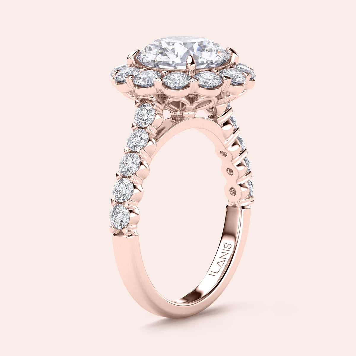 Rose gold engagement ring with halo and round-cut diamonds, available in 14K, 18K, or platinum.Elegant design with brilliant sparkle.