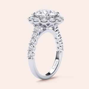 Elegant round diamond halo engagement ring in 14K/18K gold or platinum with a stunning central diamond and diamond-encrusted band.