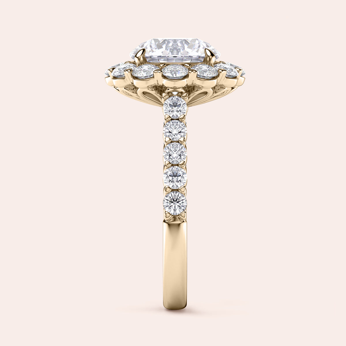 Elegant ring featuring an emerald-shaped diamond with round diamonds, available in 14K/18K gold or platinum.